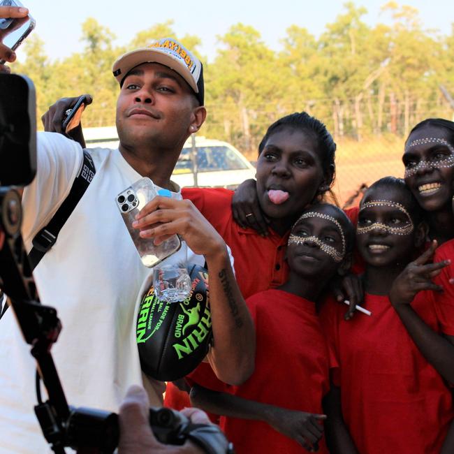 Darwin born Mak Mak Marranunggu rapper J-MILLA greets fans ahead of a concert in Wadeye on June 1, 2023. Picture: Jason Walls