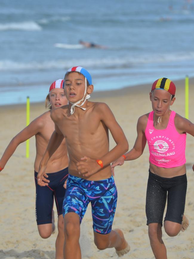 Running action at the Queensland Youth Surf Life Saving Championships on February 17.