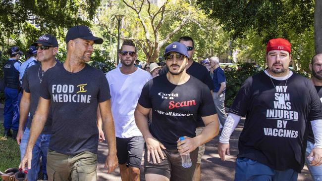 Pete Evans is seen leaving Hyde Park with his minders after attending the Millions March Against Mandatory COVID Vaccinations in Sydney in February. Picture: NCA NewsWire / Jenny Evans