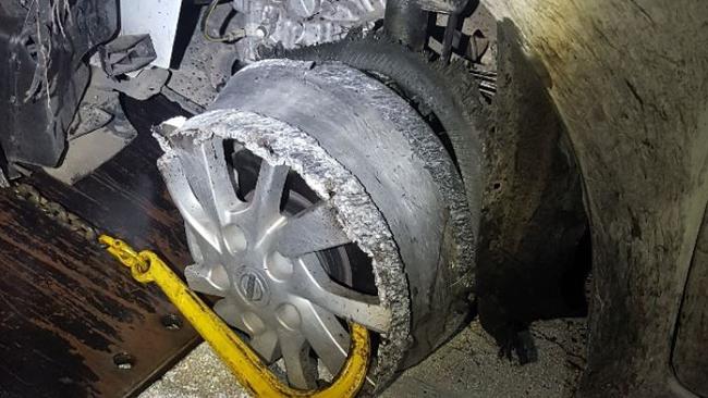 A car was found with a missing tyre on Yarra Rd in Warrandyte early on July 15. Picture: Victoria Police.