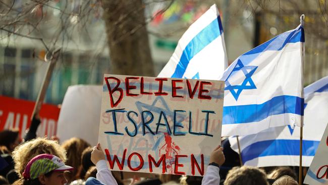 Demonstrators gather during a "#metoo unless you are a Jew" protest outside of United Nations headquarters in New York City on December 4, 2023.