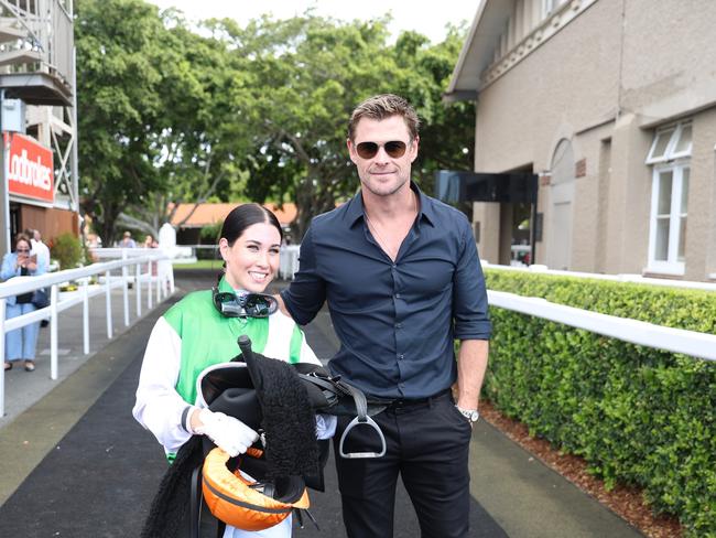 Superstar actor Chris Hemsworth congratulates young jockey Courtney Bellamy on her first Saturday winner at Eagle Farm. Picture: Supplied,