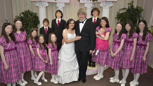 David and Louise Turpin with the 13 children they’re accused of torturing. Louise Turpin would drive one of the boys to community college classes, waiting to take him home as soon as lessons ended. Picture: Supplied