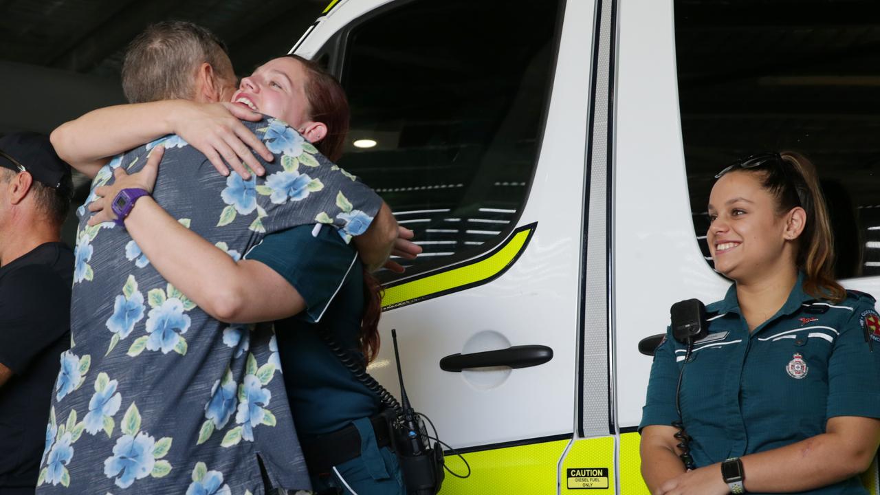 Rick Bettua hugs paramedic Alicia Locke, who helped saved his life at the boat ramp. Picture: Lachie Millard