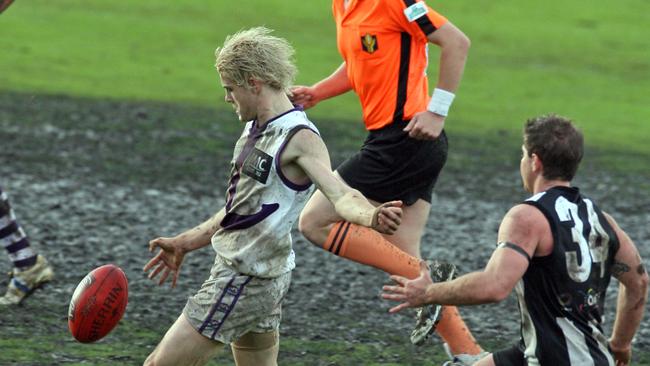 Luke Russell playing for Burnie before being drafted to the Gold Coast Suns in the AFL.