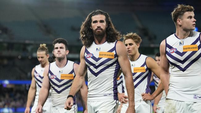 The Dockers leave the ground after being well beaten. (Photo by Daniel Pockett/Getty Images)