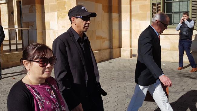 Shannon Lee Goldsmith, centre, outside the Adelaide Magistrates Court where he is accused of assaulting a man on Hindley St. Picture: Sean Fewster.