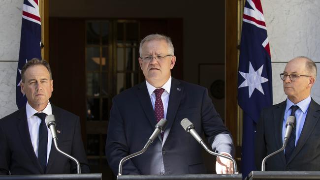 Health Minister Greg Hunt with Prime Minister Scott Morrison and the Deputy Chief Medical Officer Paul Kelly, during a Coronavirus Press conference at Parliament House in Canberra. Picture: Gary Ramage