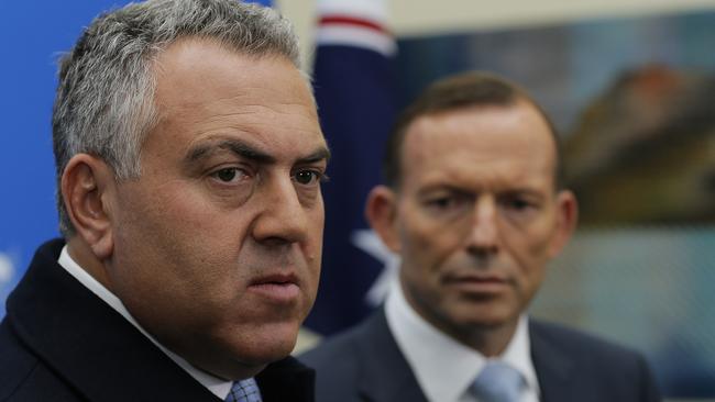 Treasurer Joe Hockey, (left) and Prime Minister Tony Abbott speak to media at Hobart Airport