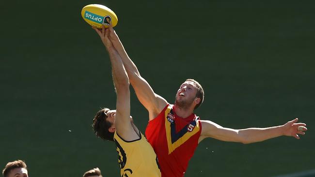 PERTH, AUSTRALIA - MAY 12: Corey Gault of the WAFL and Michael Knoll of the SANFL contest the ruck during the state game between WA and SA at Optus Stadium on May 12, 2019 in Perth, Australia. (Photo by Paul Kane/Getty Images)