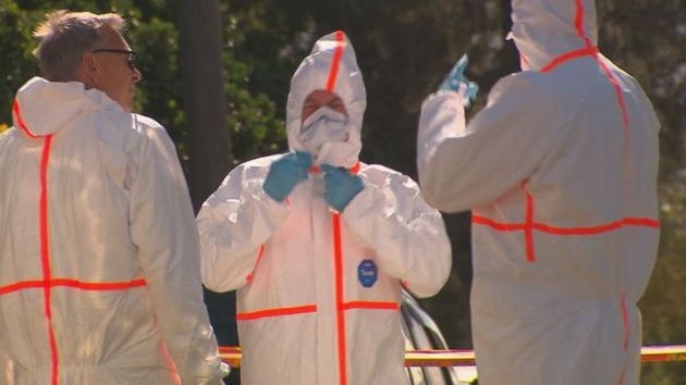 Authorities and investigators in Mariposa Rd, Bilgola Plateau, after asbestos fibres were spread across a number of homes allegedly by cleaning contractors using high-pressure hoses on a roof. Picture: Channel 9 News