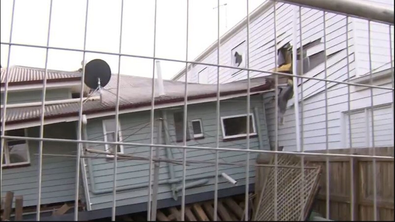 Footage has captured the moment a Queensland home undergoing renovations collapsed onto its neighbour’s, leaving both property owners with millions of dollars worth of damages. Picture: 9 News