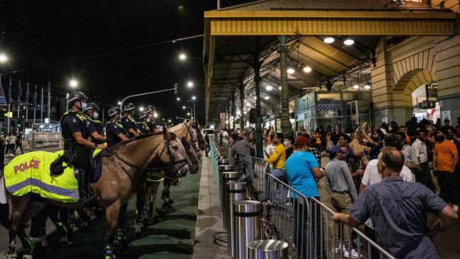 Mounted police officers patrol Flinders Street Station during New Year’s Eve celebrations. Picture: Getty Images