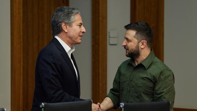 Ukrainian President Volodymyr Zelensky shakes hands with US Secretary of State Antony Blinken during a meeting that also included US Secretary of Defence Lloyd Austin on April 24 in Kyiv.