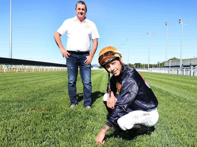 Gold Coast Turf Club  Chairman Brett Cook and jocker Jag Guthmann-Chester check the new track before Men Matter race day at Gold Coast Turf Club . Picture Glenn Hampson