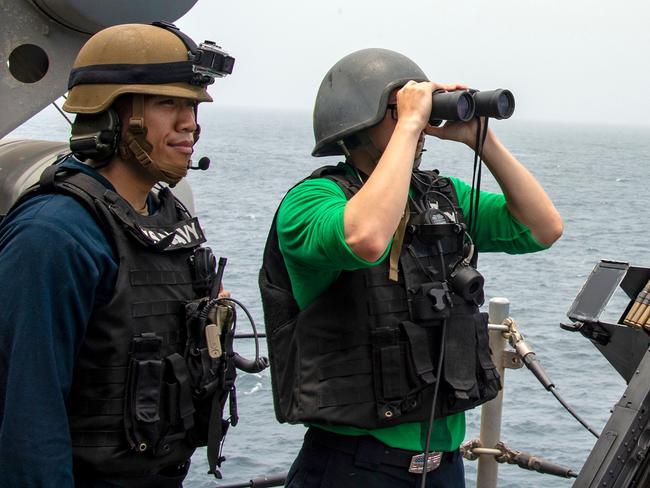 US sailors keep watch on the Strait of Hormuz. Picture: AFP