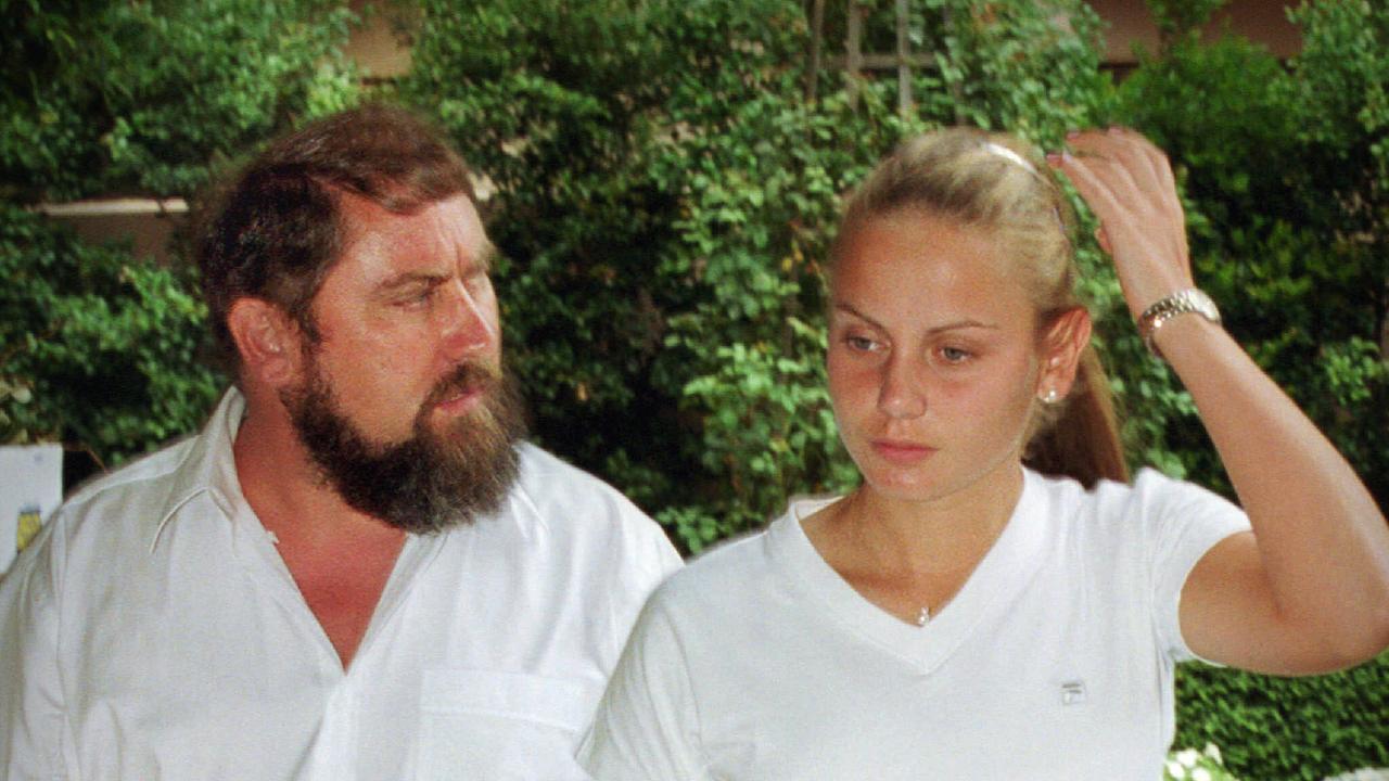 Jelena Dokic (r) with her father Damir Dokic in Melbourne 15 Jan 2001.