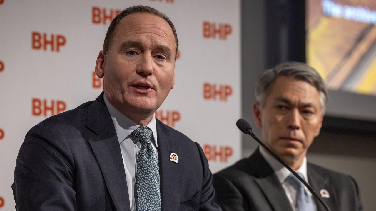 BHP chair Ken McKenzie and CEO Mike Henry at the Adelaide Convention Centre in SA for the company’s 2024 AGM. Picture: NCA NewsWIRE / Emma Brasier