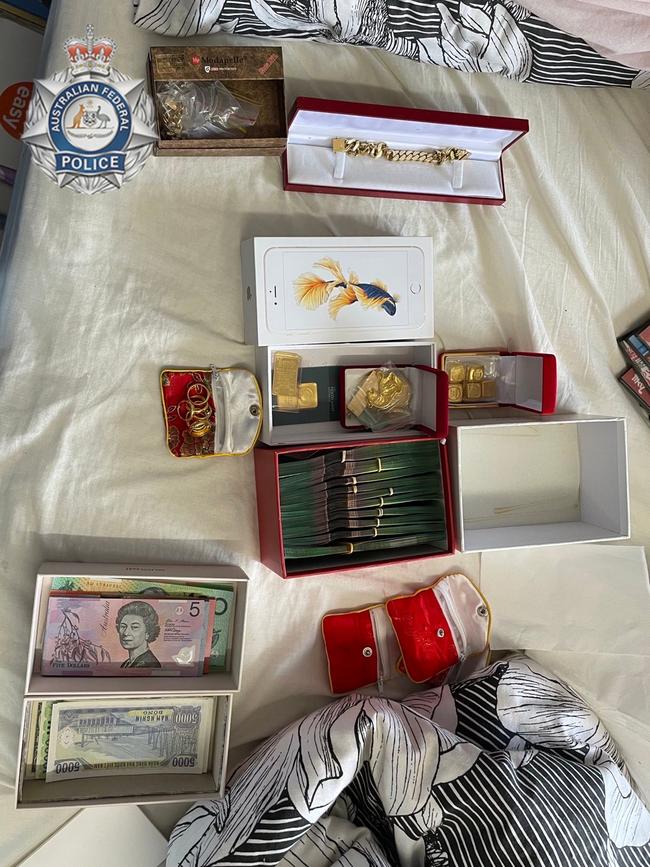 Some of the cash and gold seized in the raids.