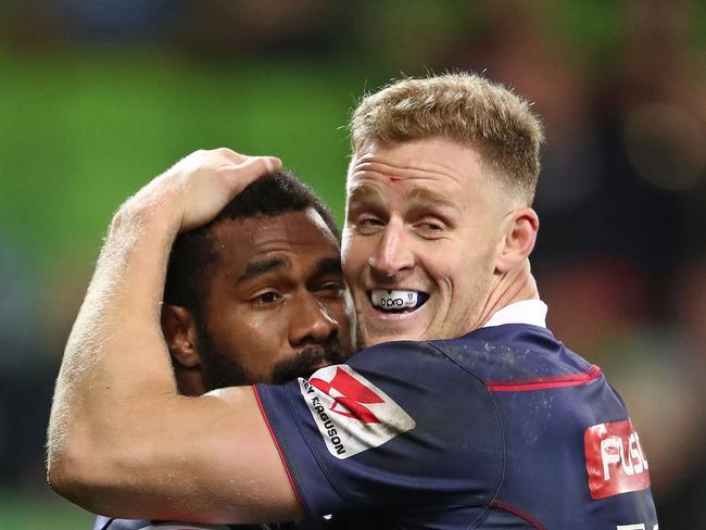 MELBOURNE, AUSTRALIA - MAY 25:  Marika Koroibete of the Rebels is congratulated by Reece Hodge after scoring his third try  during the round 15 Super Rugby match between the Rebels and the Sunwolves at AAMI Park on May 25, 2018 in Melbourne, Australia.  (Photo by Scott Barbour/Getty Images)