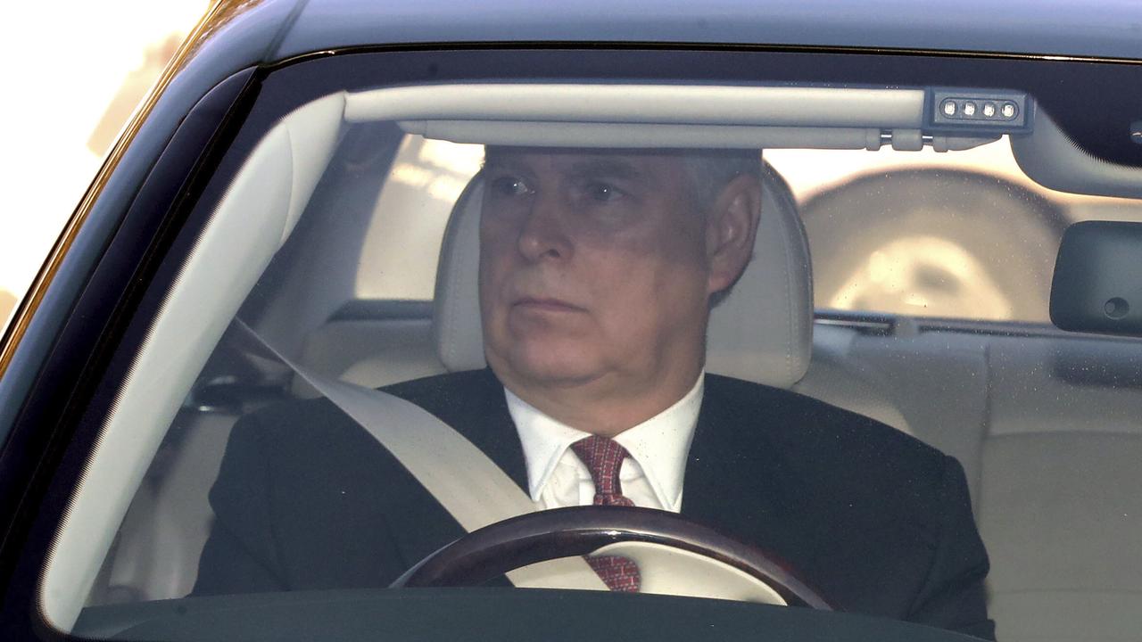 Britain's Prince Andrew drives into Buckingham Palace, as he arrives for the traditional Queen's Christmas lunch. Picture: Aaron Chown/PA via AP