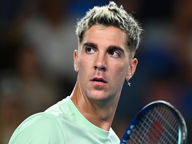 MELBOURNE, AUSTRALIA - JANUARY 17: Thanasi Kokkinakis of Australia reacts  during their round one singles match against Fabio Fognini of Italy during day two of the 2023 Australian Open at Melbourne Park on January 17, 2023 in Melbourne, Australia. (Photo by Quinn Rooney/Getty Images)