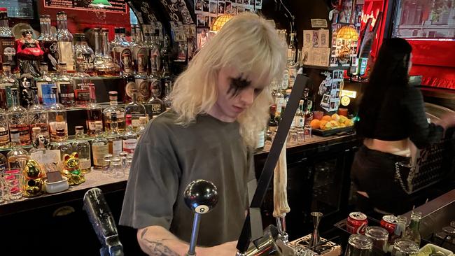 Bartender Angus McQueenie pours a beer at Heartbreaker Bar in Melbourne's CBD. Picture: Kiel Egging.