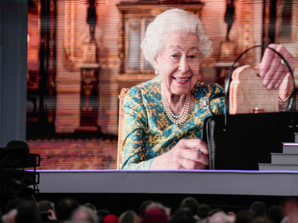 Britain's Queen Elizabeth II is seen on screen at the start of the Platinum Party at Buckingham Palace. Picture Getty