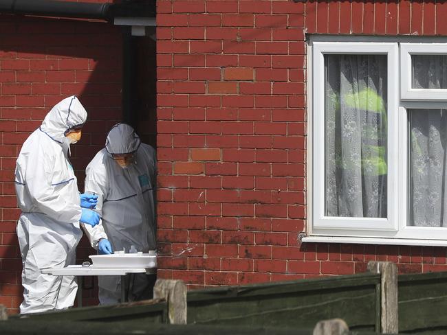 Police forensic investigators search the property of Salmon Abedi. Picture: AP