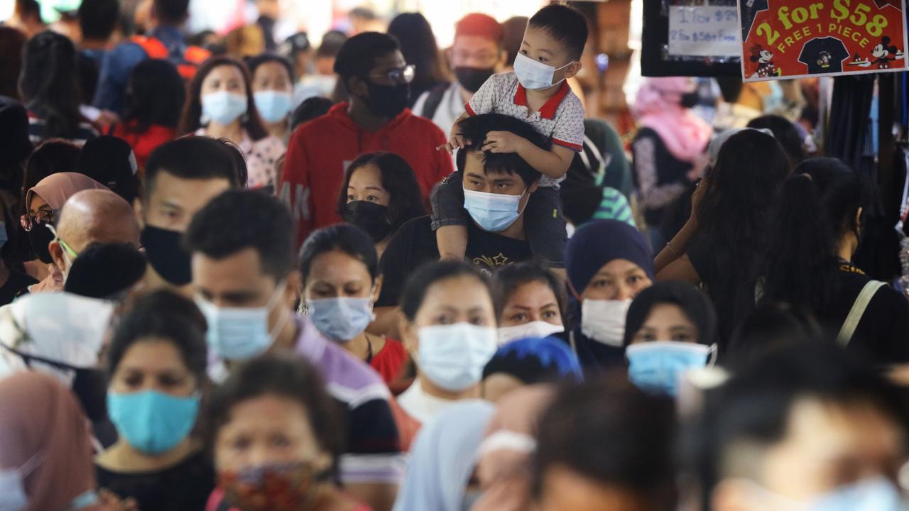 Singapore’s Covid restrictions have been extended by another month as cases surge. Picture: Suhaimi Abdullah/Getty Images