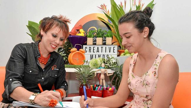 GETTING CRAFTY: Director of Redhotblue Jody Euler and Olivia Laval get creative. Picture: Tony Martin