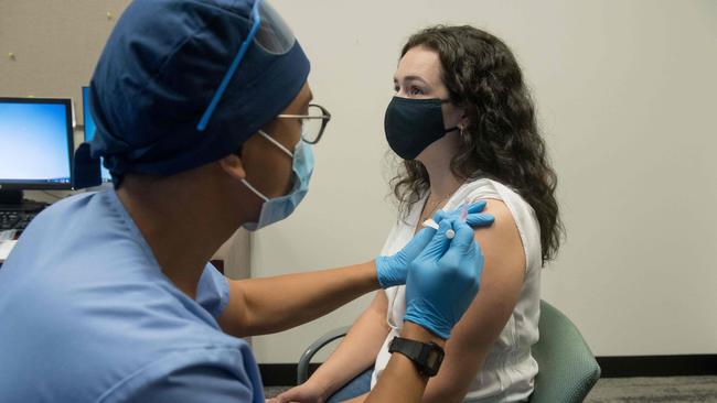 A woman receives the Moderna coronavirus vaccine. Picture: AFP