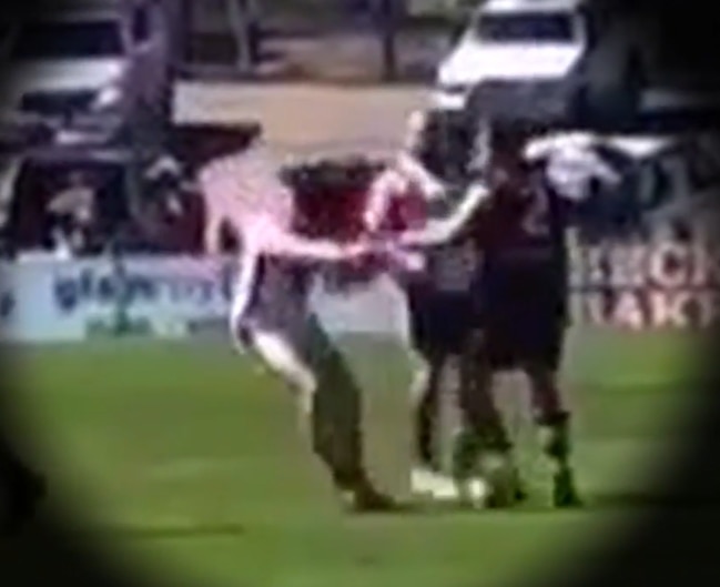 Still image of a punch during the B-Grade Southern Football League Grand Final between Christies Beach FC and Flagstaff Hill which left one man in hospital and the aggressor in prison.