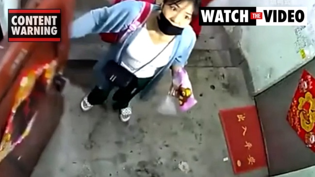 A man wearing a raincoat attacks a woman and her daughter in China