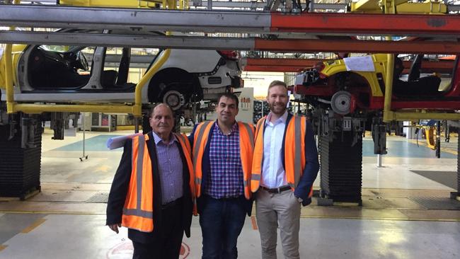 Mark Sellar, right, with Ross Pelligra and his grandfather Ross Snr at the Holden factory in October this year. Picture: Mark Sellar