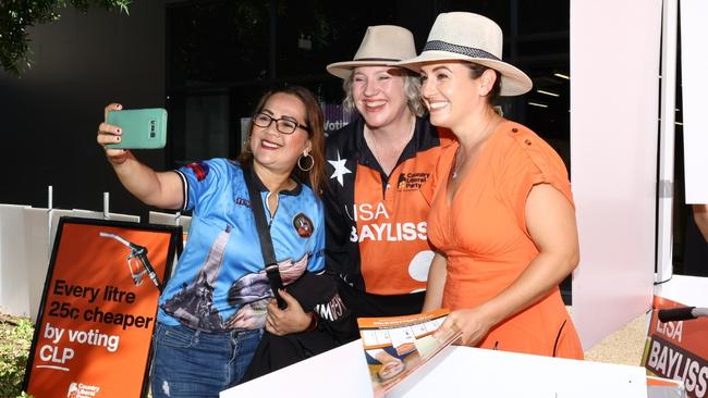 CLP candidate Lisa Bayliss and Chief Minister Lia Finocchiaro greet a voter on election day, May 3. Picture: Pema Tamang Pakhrin