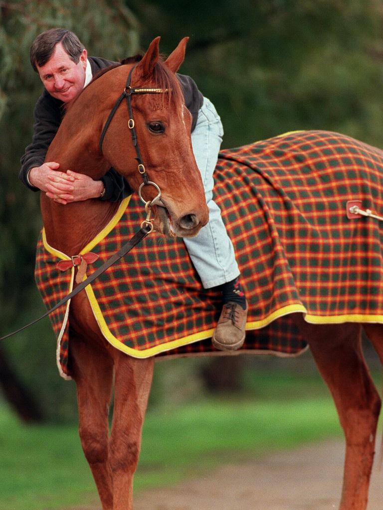 Pat Hyland hugging racehorse Best Endeavours.