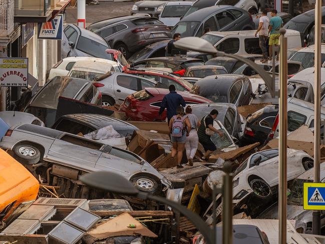 Cars are piled in the street in Sedava, Spain. Picture: Getty Images