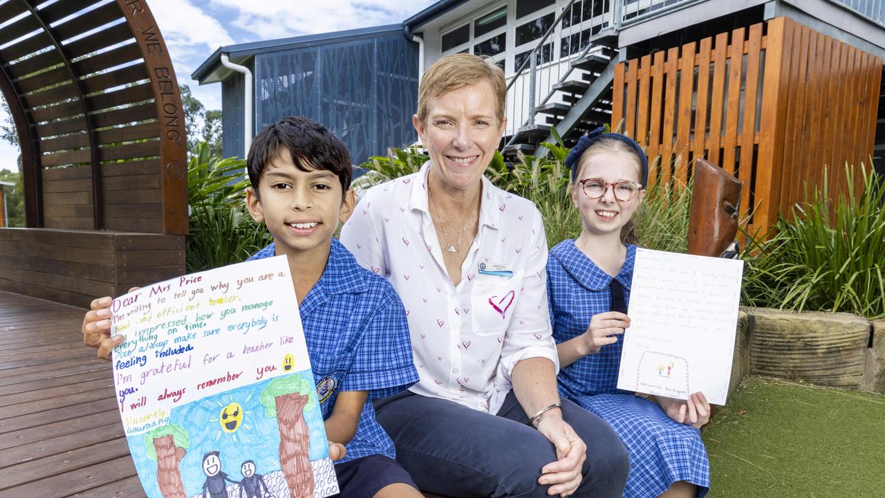 Northgate State School students Gauraang Suneja and Posy Hooper with teacher Janet Price. Picture: Richard Walker