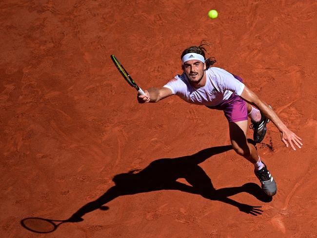 Stefanos Tsitsipas reaches for the ball during the French Open final. Picture: AFP