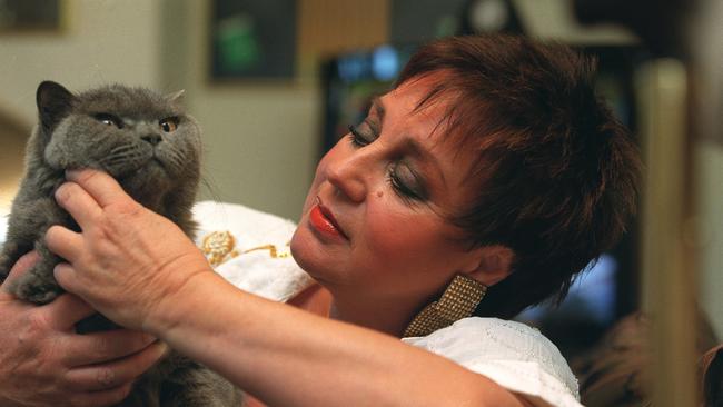 2000: Wills at home with her pet cat.