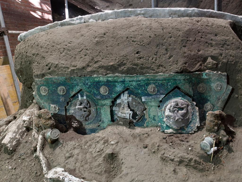 A large Roman four-wheel ceremonial chariot was also recently discovered at the Pompeii site. Picture: Pompeii Archaeological Park / AFP