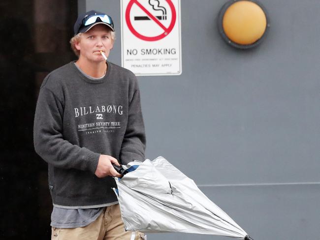 Robert Calamatta leaves Wyong Local Court after an earlier appearance. (AAP Image/Sue Graham)