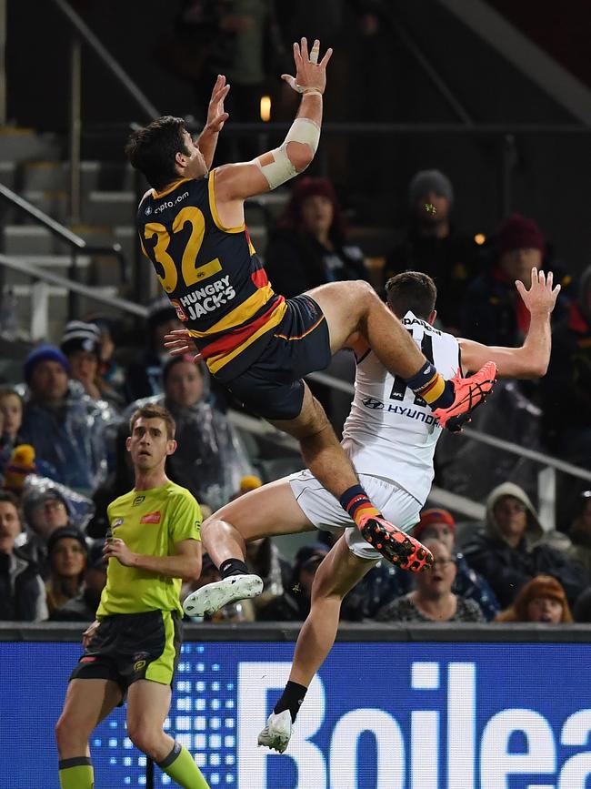 Darcy Fogarty soars above Carlton’s Mitch McGovern. Picture: Mark Brake/Getty Image)