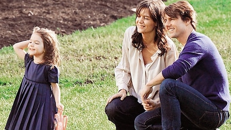 Holmes with ex-husband Tom Cruise and daughter Suri in Australia in 2009. (Picture: Big Pictures)