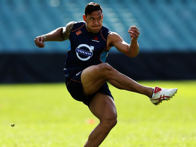 Israel Folau kicks during the Waratahs Super Rugby Captain's Run ahead of their match against the Brumbies at Allianz Stadium, Sydney. Pic Brett Costello