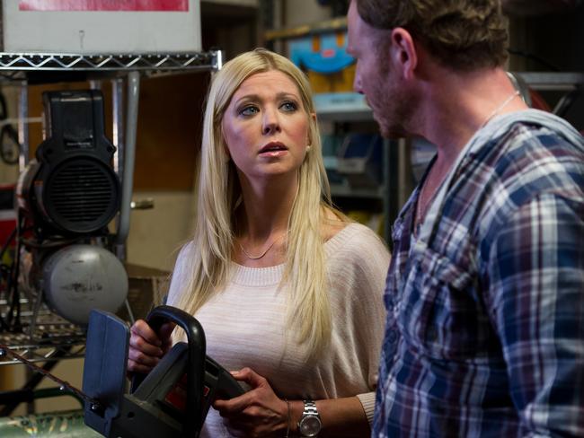 Tara Reid and Ian Ziering star in the mockbuster television movie Sharknado.