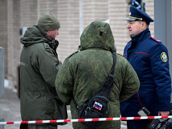 Investigators were confronted with a bloody scene in fresh snow. Picture: AFP