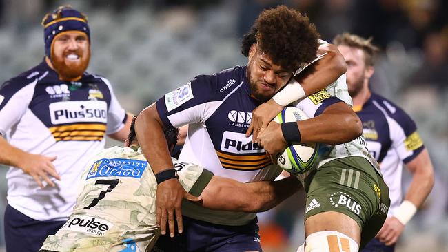 Brumbies backrower Robbie Valetini is tackled during the round five Super Rugby Trans-Tasman against the Highlanders at GIO Stadium. Picture: Getty Images