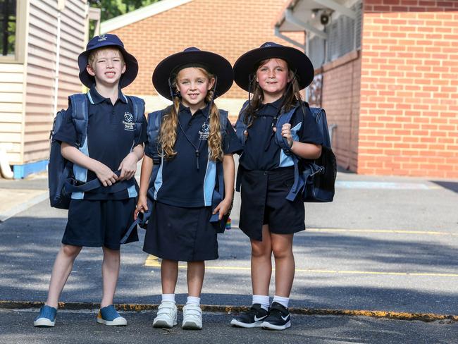 Mason, 5, Bella, 5, and Poppy, 5 are all geared up for their first day of school. Picture: Tim Carrafa